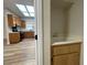 Mud room featuring a utility sink, storage, and a partial view of a kitchen at 3161 Quail Song Dr # 3161, Laughlin, NV 89029