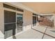 Relaxing covered patio with exterior access and view of common landscape at 3161 Quail Song Dr # 3161, Laughlin, NV 89029