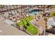 Great view of the community putting green, pool and BBQ area, beautifully maintained with lush landscaping at 3161 Quail Song Dr # 3161, Laughlin, NV 89029
