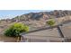 Close up exterior showcasing the roof, nearby desert, and mountain views at 3161 Quail Song Dr # 3161, Laughlin, NV 89029