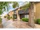 Charming townhome showcasing desert landscaping and a cozy, inviting front entryway at 3221 Yolanda Ln, Las Vegas, NV 89121