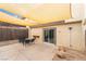 Enjoy outdoor living on this covered patio with sliding door access to the home at 3221 Yolanda Ln, Las Vegas, NV 89121