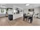 Open concept dining area next to kitchen boasts contemporary decor and ample natural light at 3509 Navajo Way, Las Vegas, NV 89108
