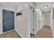 Clean hallway boasts new flooring and paint with updated doors and trim at 3509 Navajo Way, Las Vegas, NV 89108