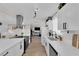 Bright kitchen features white cabinets, stainless steel appliances, and modern fixtures at 3509 Navajo Way, Las Vegas, NV 89108