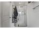 Modern bathroom with shower featuring sleek glass door and modern fixtures at 3641 Portici Ln, Henderson, NV 89044