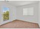 Neutral bedroom featuring a door to an outdoor area at 3689 Bufflehead St, Las Vegas, NV 89122