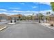 Gated community entrance offering security and privacy for residents with palm trees and desert landscaping at 3689 Bufflehead St, Las Vegas, NV 89122