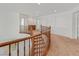 Light filled hallway with wood trim and neutral carpeting at 3689 Bufflehead St, Las Vegas, NV 89122