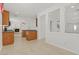 Spacious kitchen with wood cabinets, and a large island overlooking the living area at 3689 Bufflehead St, Las Vegas, NV 89122