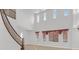 Bright living room showcasing a high ceiling, natural light, and staircase at 3689 Bufflehead St, Las Vegas, NV 89122