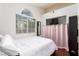 Bright bedroom features a window, closet and hardwood floors at 3825 Manhattan Bridge Pl, North Las Vegas, NV 89032
