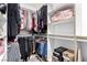 Walk-in closet is well organized with lots of hanging space and storage at 3825 Manhattan Bridge Pl, North Las Vegas, NV 89032