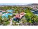 Aerial view of resort-style pool and playground area in a vibrant community at 389 Fringe Ruff Dr, Las Vegas, NV 89148