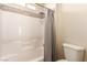 Clean bathroom with a shower-tub combination and tiled walls at 389 Fringe Ruff Dr, Las Vegas, NV 89148