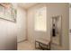 Cozy entryway features tile flooring, a bench, and a large mirror at 389 Fringe Ruff Dr, Las Vegas, NV 89148