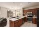 Stylish kitchen with modern appliances and adjacent dining area with backyard access at 389 Fringe Ruff Dr, Las Vegas, NV 89148