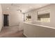 Bright loft space with carpet flooring and windows offering natural light at 389 Fringe Ruff Dr, Las Vegas, NV 89148