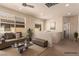 Comfortably staged loft with a modern sofa and stylish decor at 389 Fringe Ruff Dr, Las Vegas, NV 89148