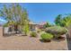 Backyard featuring desert landscaping and a view of the home at 4369 Meadowlark Wing Way, North Las Vegas, NV 89084