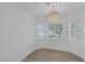 Bright dining room showcasing neutral walls and light, airy atmosphere at 4369 Meadowlark Wing Way, North Las Vegas, NV 89084