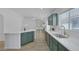 Bright kitchen with stainless appliances, quartz countertops, and updated cabinetry at 4369 Meadowlark Wing Way, North Las Vegas, NV 89084