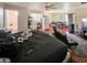 Large bedroom with connected living room, dining room, and kitchen spaces at 4428 Los Reyes Ct, Las Vegas, NV 89121