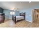 This bedroom offers stylish wood-look floors and a ceiling fan for added comfort at 4428 Los Reyes Ct, Las Vegas, NV 89121