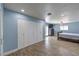 Spacious bedroom boasts a ceiling fan, recessed lighting, and double-door closets at 4428 Los Reyes Ct, Las Vegas, NV 89121