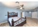 Large bedroom offering modern ceiling fan, recessed lighting, and wood-look floors at 4428 Los Reyes Ct, Las Vegas, NV 89121