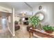 Spacious living room with tile floors, a fireplace, and a ceiling fan for added comfort at 4428 Los Reyes Ct, Las Vegas, NV 89121