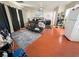 Open-concept living room with modern decor, laminate flooring, and lots of natural light at 4428 Los Reyes Ct, Las Vegas, NV 89121