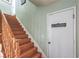 Wooden staircase leading to the next floor, next to a door labeled 'Accessories' at 4428 Los Reyes Ct, Las Vegas, NV 89121