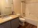 Bathroom featuring granite vanity and tiled shower-tub combo at 4555 E Sahara Ave # 288, Las Vegas, NV 89104