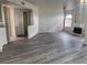 Open living room boasts gray floors, fireplace, and recessed lighting at 4555 E Sahara Ave # 288, Las Vegas, NV 89104