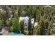 An aerial view of the home showing mature trees and the community at 4778 Knotty Pine Way, Las Vegas, NV 89124