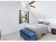 This bedroom features a cozy atmosphere with a wooden ceiling fan and light-filled window at 4778 Knotty Pine Way, Las Vegas, NV 89124