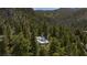 Charming home nestled among lush trees with mountain views at 4778 Knotty Pine Way, Las Vegas, NV 89124