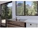 Gourmet kitchen boasts stainless steel appliances, stone countertops, and mountain views at 4778 Knotty Pine Way, Las Vegas, NV 89124
