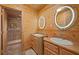 The bathroom features double vanity and a full shower at 4830 Silver Tip Way, Mount Charleston, NV 89124