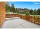 Concrete patio with a wood fence and mountain views at 4830 Silver Tip Way, Mount Charleston, NV 89124