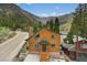 Charming cabin exterior featuring a classic design with a mountain backdrop at 4830 Silver Tip Way, Mount Charleston, NV 89124