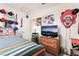Bedroom featuring a decorated wall and storage space at 521 Landra Ln, Henderson, NV 89015