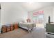 Bright bedroom with sliding glass doors and walk-in closet at 521 Landra Ln, Henderson, NV 89015