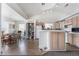 Open kitchen layout with dining area, pantry, and plenty of storage space at 521 Landra Ln, Henderson, NV 89015