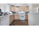 Well-appointed kitchen featuring modern appliances and lots of counter space at 521 Landra Ln, Henderson, NV 89015