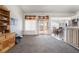 Spacious living area with sliding glass doors that lead to the patio at 521 Landra Ln, Henderson, NV 89015