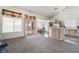 Open-concept floorplan featuring a living room area adjacent to the eat-in kitchen at 521 Landra Ln, Henderson, NV 89015