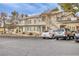 Multi-Gathering building with covered parking and well-maintained landscaping under a cloudy sky at 5265 Caspian Springs Dr # 201, Las Vegas, NV 89120