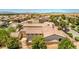 Aerial view of backyard featuring a private pool, fenced yard, and desert landscaping at 5396 Splendido Ave, Pahrump, NV 89061